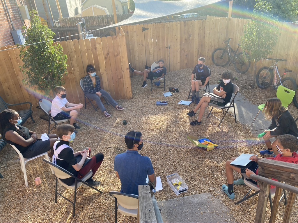 Embark Group Discussion outside in circle